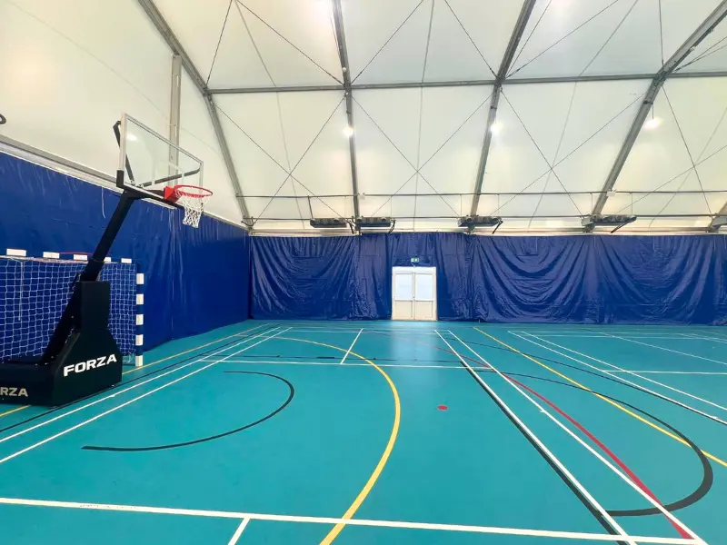 Engineering Versatility and Scalability in Tensile Sports Halls
